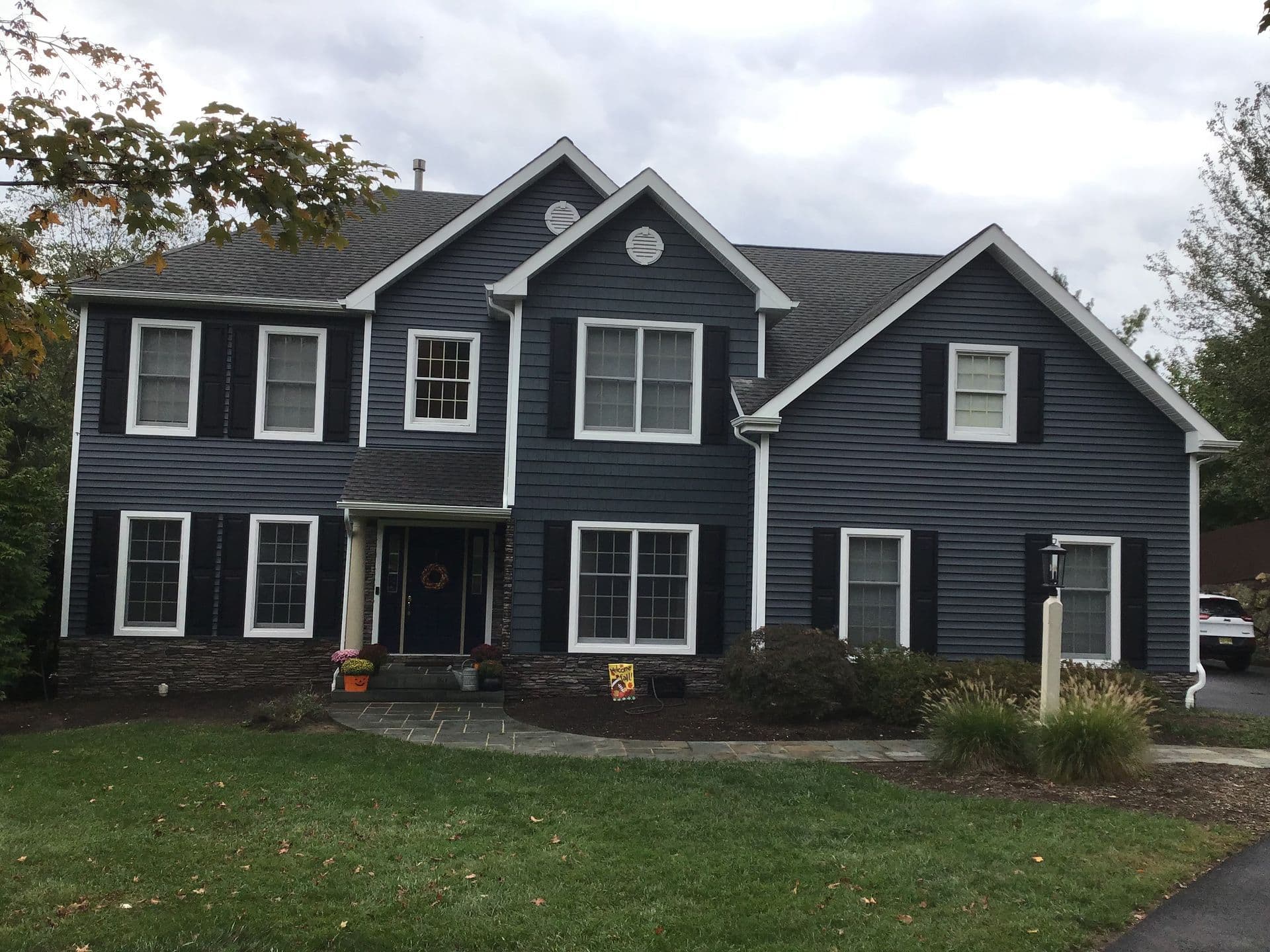 Superior Home Exteriors project — Siding rear elevation · deck and stair detail